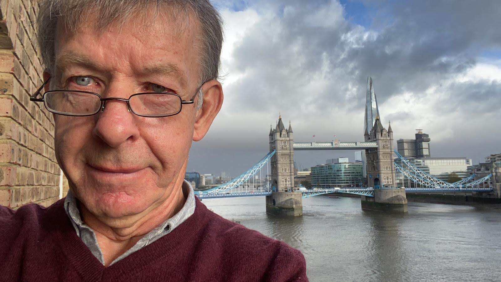 Chris, your London Blue Badge guide, in front of Tower Bridge